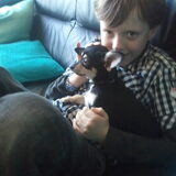 Mijn zoon van 9 jaar met Lizzy. De eerste dag bij ons.