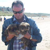 op het strand